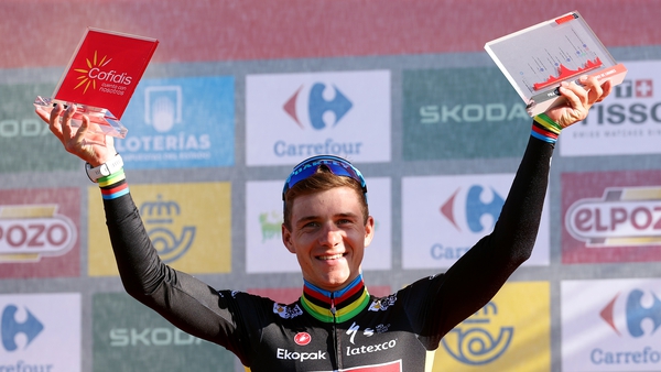 Remco Evenepoel celebrates his Stage 18 victory