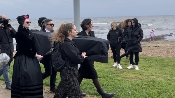 A wake was held on the shore this afternoon to mourn what campaigners say is the death of the lough