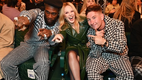 Burna Boy, Kylie Minogue and Barry Keoghan attend the Burberry Spring Summer 2024. Getty Images.
