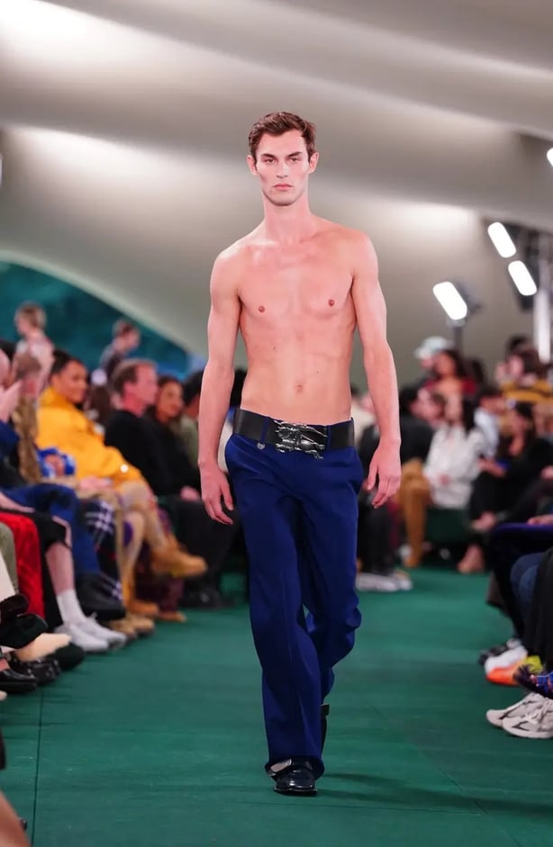 A shirtless model closed the show (Ian West/PA)