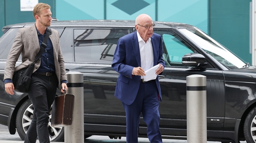 Rupert Murdoch (right) is ending a more than 70 year career in the media