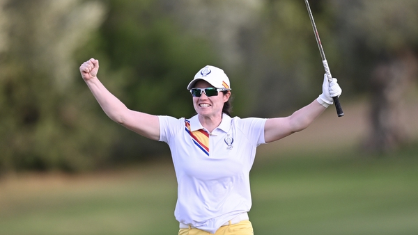 Leona Maguire celebrates after chipping in on 18th to win her fourballs match in dramatic fashion