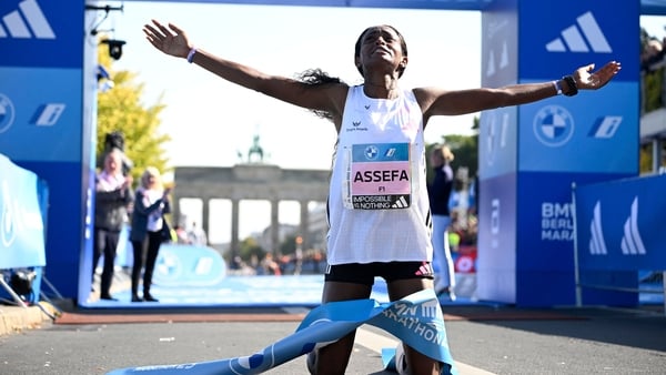 Ethiopia's Tigist Assefa celebrates after crossing the line