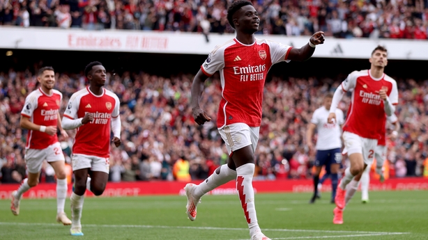 Son's double earns Tottenham 2-2 draw at Arsenal