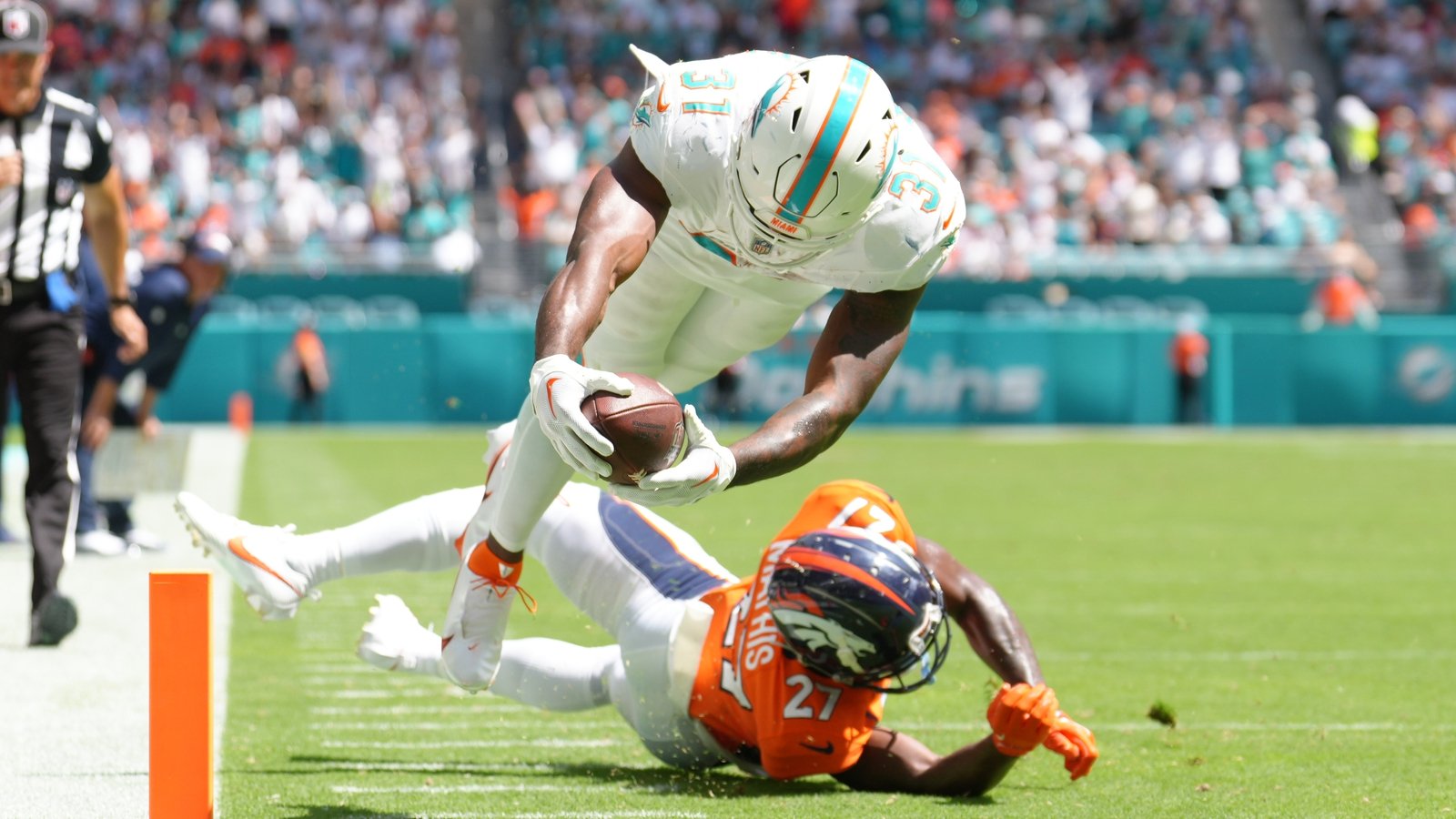 Miami Dolphins defeat Denver Broncos 70-20 in their first home