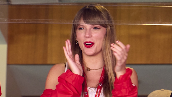 Taylor Swift cheers from a suite as the Kansas City Chiefs play the Chicago Bear