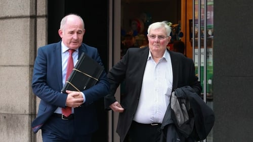 Eamon Butterly, right, was answering questions in the witness box at the Stardust inquests for a fifth day