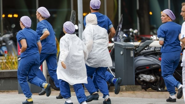 Medical staff flee the Erasmus MC hospital in Rotterdam