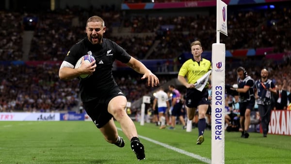 Dane Coles runs over for New Zealand's 13th try of the night