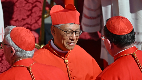 Newly elevated cardinal, Chinese bishop of Hong-Kong Stephen Chow Sau-Yan is congratulated by fellow cardinals