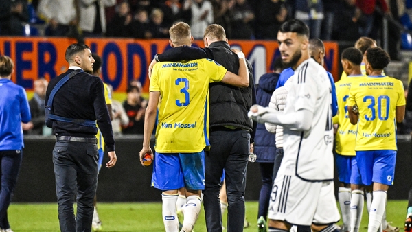 Dario van den Buijs of RKC Waalwijk is consoled after the incident