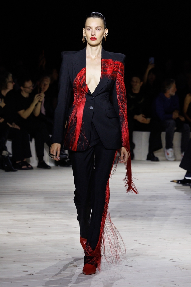 a model on the Alexander McQueen SS24 catwalk