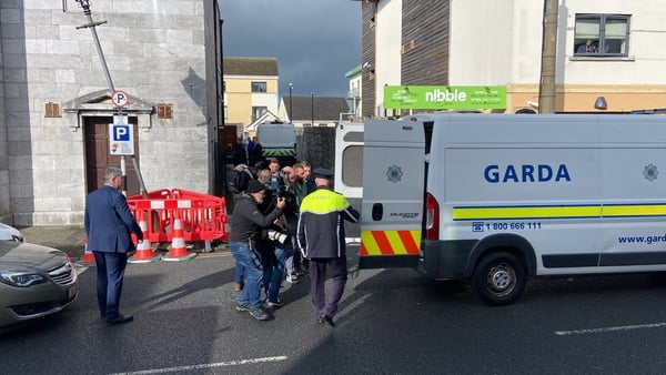 Gardaí outside Mallow District Court this morning