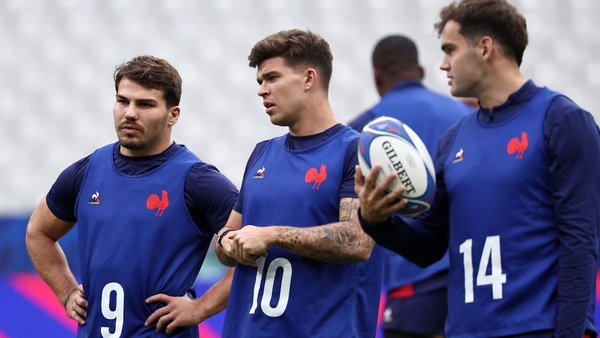 Antoine Dupont (L), Matthieu Jalibert (C) and Damian Penaud