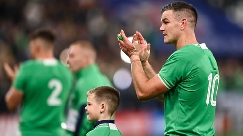 Johnny Sexton, pictured with his son Luca, following Ireland's defeat to New Zealand