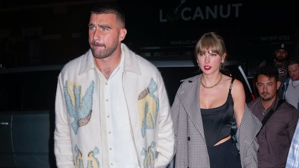 Travis Kelce and Taylor Swift arrive at the SNL afterparty on 15 October in New York City.