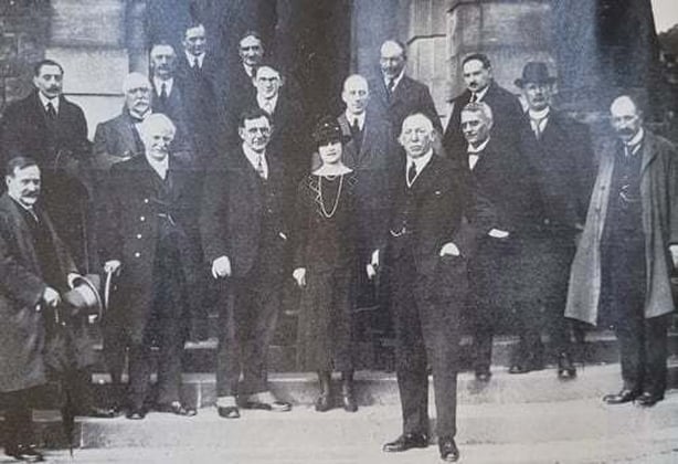 While a group of Journalists get their picture with their hosts, Sir James and Lady Craig at Stormont Castle, republican 'refugees' in the Free State claim they have been denied the right to return to their homes in the six counties without swearing an oath of allegiance. Photo: Irish Life, November 1923