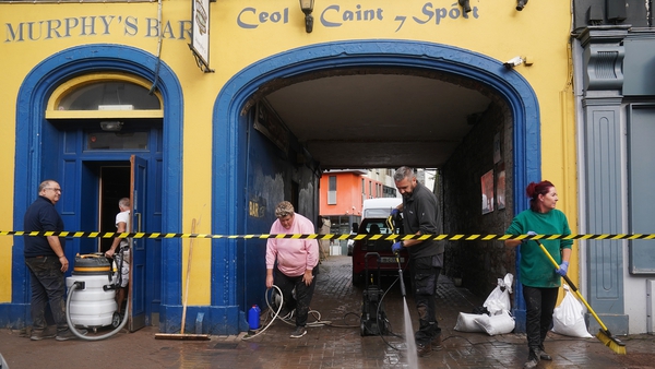 The clean up gets under way on Main Street in Midleton, Co Cork