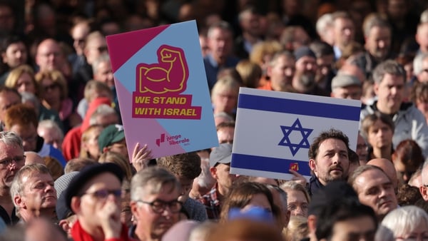 People hold up signs as they gather at a demonstration to show solidarity with Israel and against antisemitism on October 22, 2023 in Berlin, Germany. Photo: Getty Images