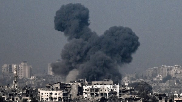 A picture taken from near the southern Israeli city of Sderot on October 28, 2023, shows smoke raising during an Israeli air strike in northern Gaza