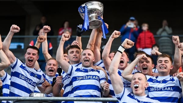 Castlehaven's players lift the Andy Scannel Cup