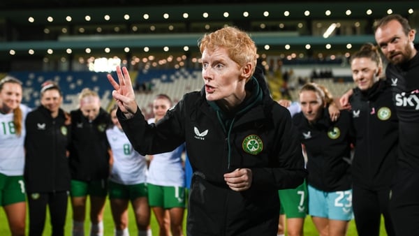 Eileen Gleeson addresses her players after a tough win in Albania