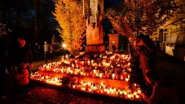 Why graveyards glowed red in Poland last night