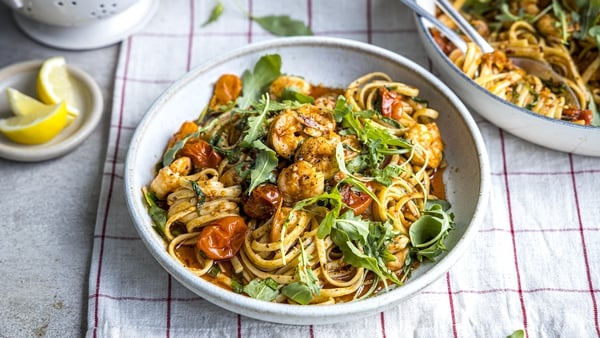 Plump prawns and juicy tomatoes that pop in your mouth make this pasta feel especially summery.