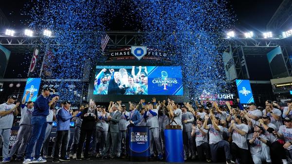 The Texas Rangers celebrate during the trophy presentation