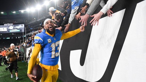 Chargers receiver Keenan Allen celebrates with supporters following the game