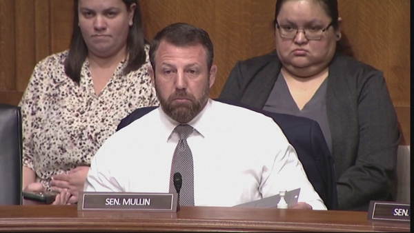 Republican Senator Markwayne Mullin rose from his seat, before the committee chair stepped in defuse the confrontation