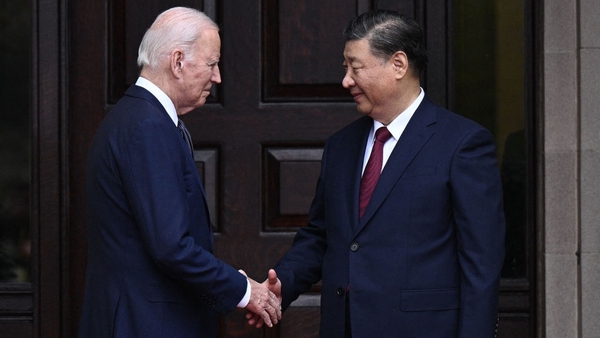 Joe Biden and Xi Jinping greet each other before their meeting