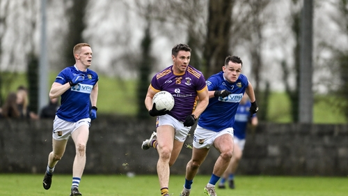 Shane Walsh of Kilmacud Crokes in action against Carl Gillespie of Ardee St Mary's