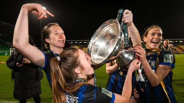 Athlone Town players, from left, Lauren Karabin, Dana Scheriff and Madison Gibson celebrate with the FAI Cup