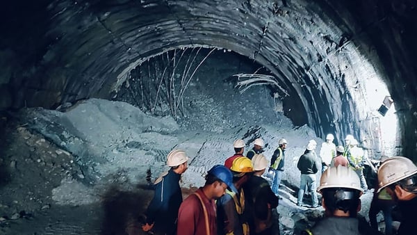 Efforts to free 41 men trapped in a collapsed road tunnel in India are continuing