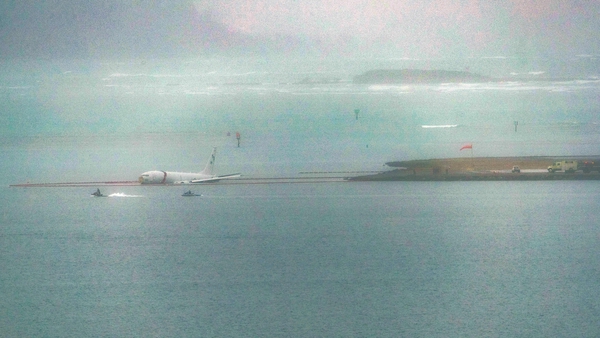 The aircraft ended up in the water after skidding off the runway
