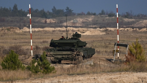 Ukrainian soldiers take part in a tank training at a training facility outside Kyiv, Ukraine, during a visit of the German Defence Minister