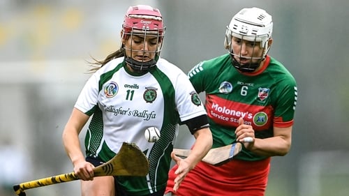 Sarsfields' Orlaith McGrath, left, tries to escape the clutches of Drom and Inch's Mairead Eviston during the 2020 All-Ireland semi-final