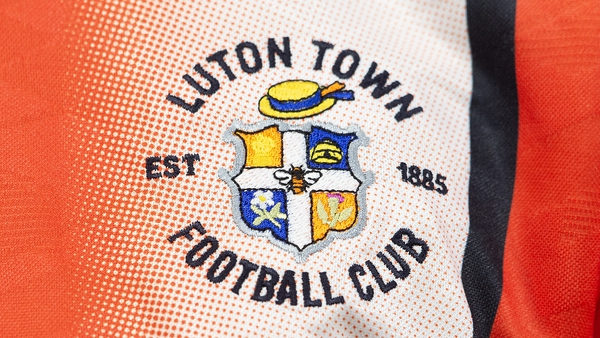 Luton Town have been fined by the Football Association for homophobic chanting by their fans at Brighton