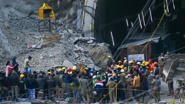 Locals gather to pray for the 41 men trappped in the tunnel