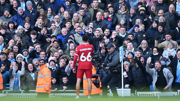 Trent Alexander-Arnold celebrates his goal in front of the Manchester City fans