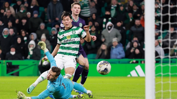 Celtic's Oh Hyeon-Gyu scores his second and Celtic's fourth goal against Hibernian