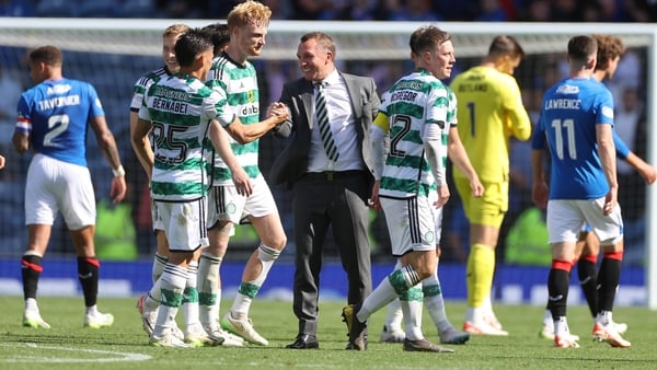 Brendan Rodgers congratulates his players after they won 1-0 at Ibrox in September