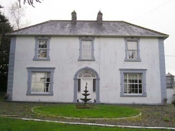 Colour photo of a farm house