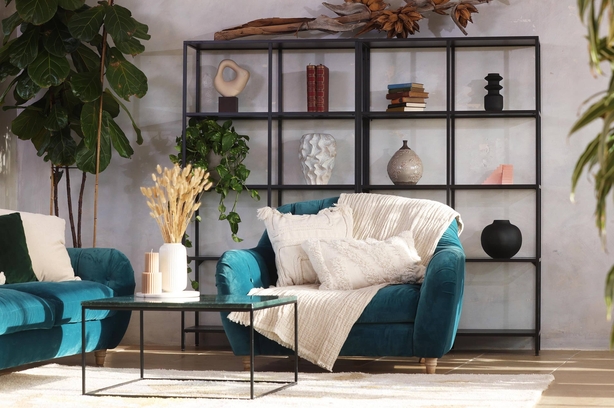 Attractive living room with throws and cushions on sofa