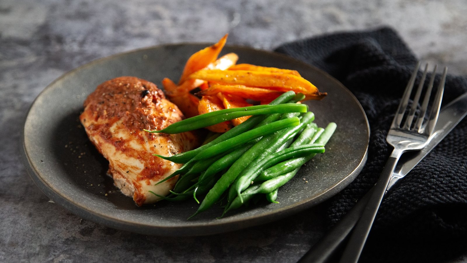 Creamy paprika chicken with sweet potato wedges