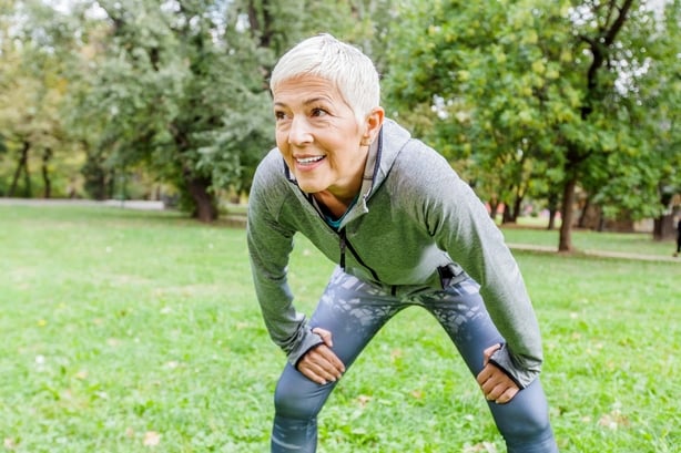 Mature white woman out for a run