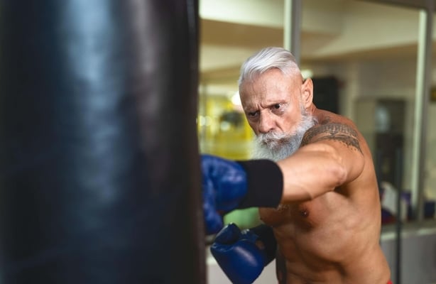 A man boxing with a punchbag