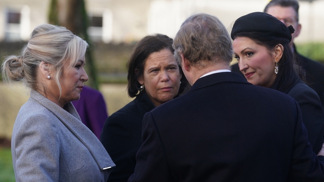 Northern Ireland's First Minister Michelle O'Neill, deputy First Minister Emma Little-Pengelly and Sinn Féin leader Mary Lou McDonald speaking to former taoiseach Enda Kenny