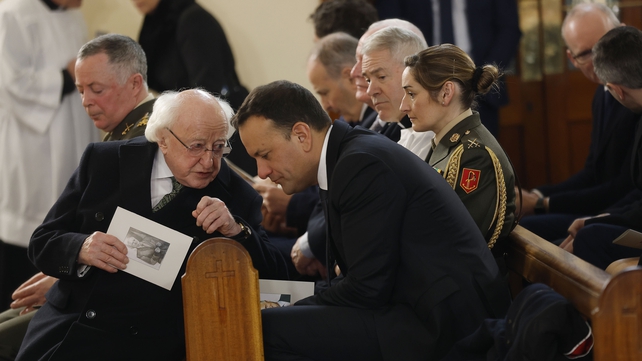 President Michael D Higgins speaks with Taoiseach Leo Varadkar inside the church in Dunboyne